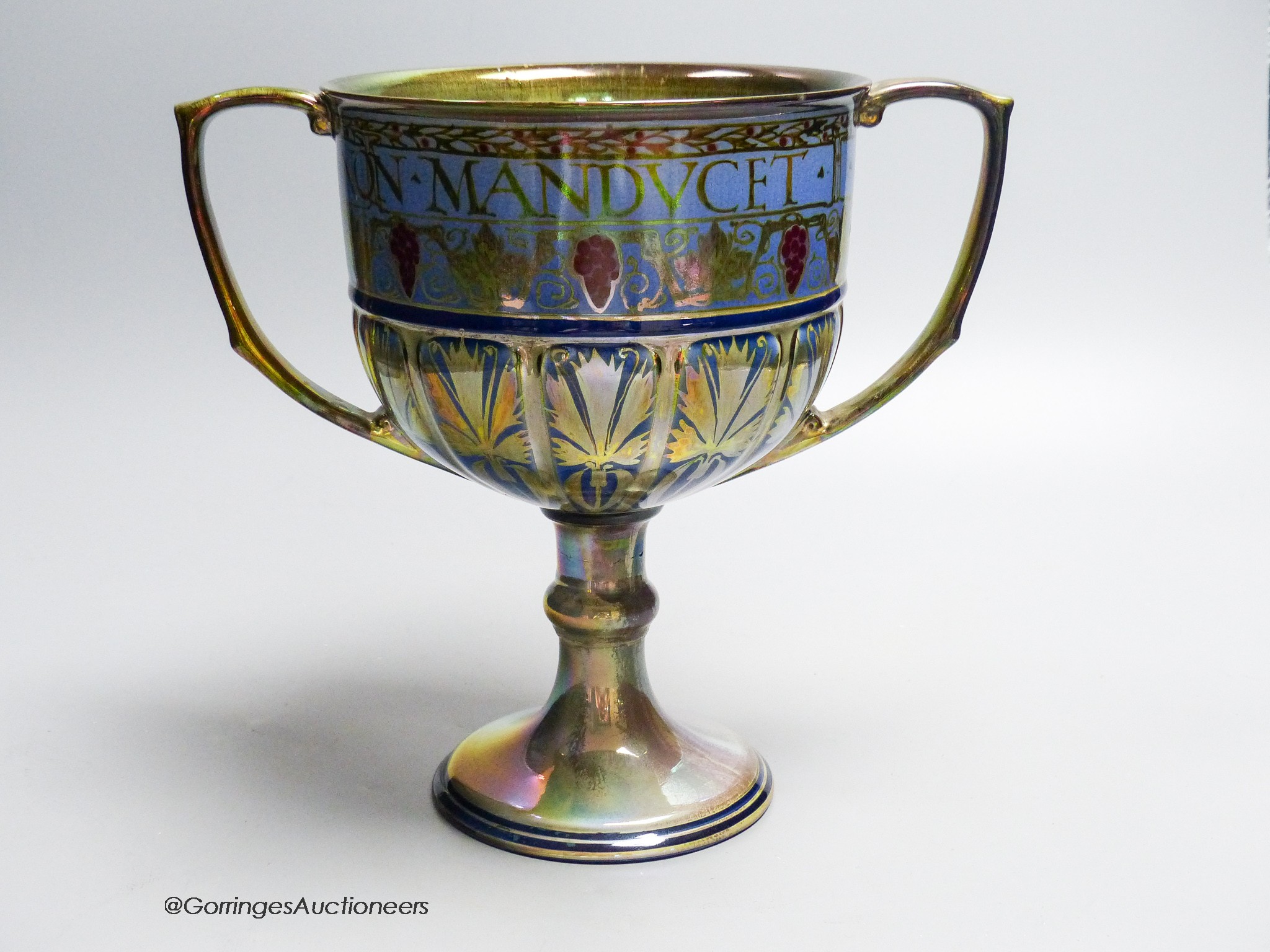 A Pilkingtons Royal Lancastrian lustre loving cup, monogram for Gordon M Forsyth, height 24cm (a.f.)
